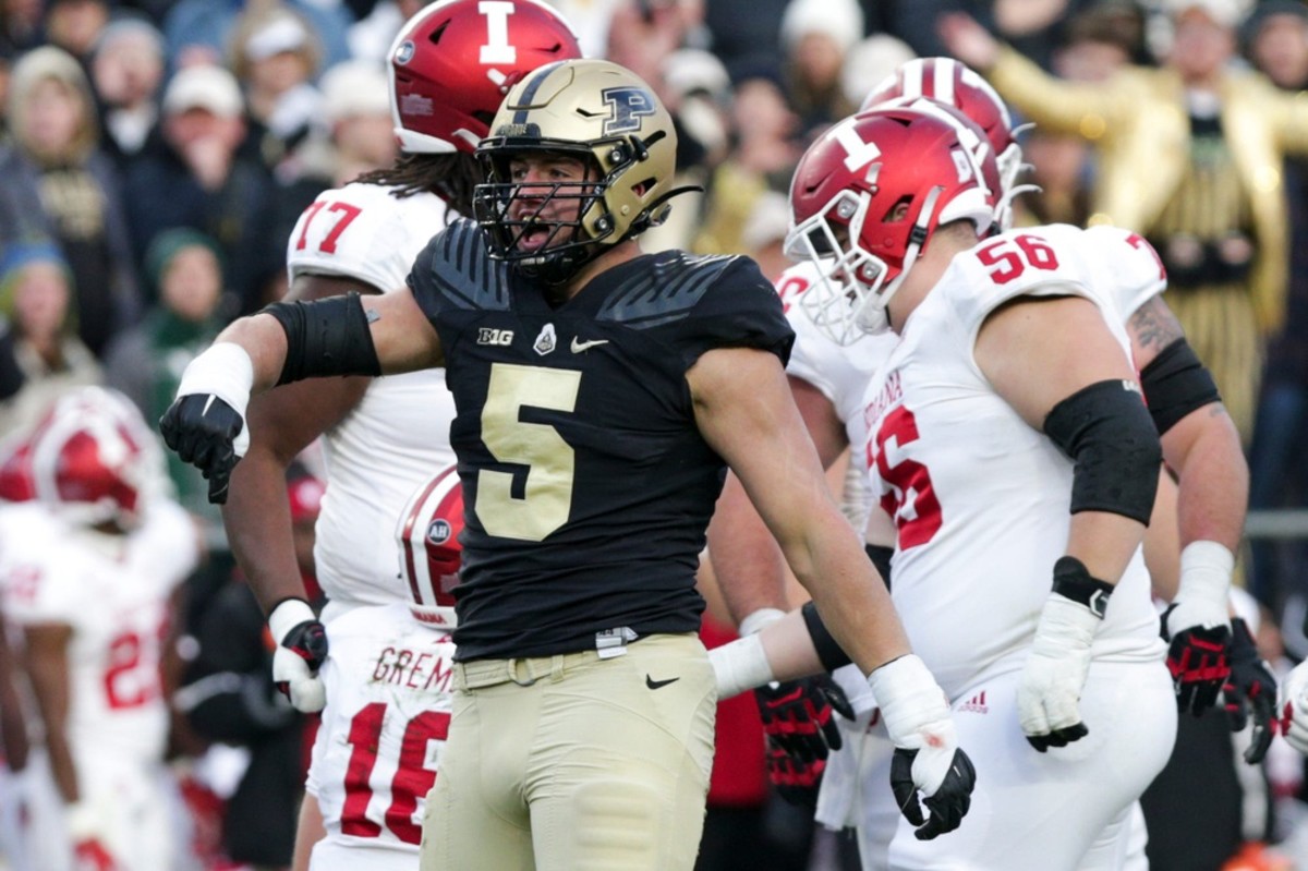 Purdue DE George Karlaftis celebrates stop